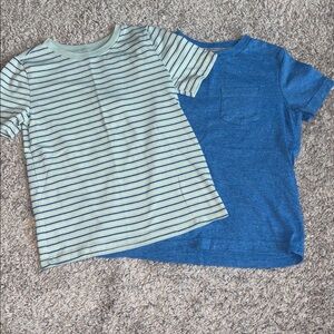 2 Old Navy, short sleeve shirts 5T and XS. Blue has pocket. Blue, cream stripe